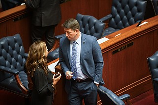 Arkansas Senator Missy Irvin, R-Mountain View, left, talks with Senator Joshua Bryant, R-Rogers, talk on the floor of the Arkansas senate before the start of a senate floor session at the State Capitol on Wednesday, April 24, 2024...(Arkansas Democrat-Gazette/Stephen Swofford)